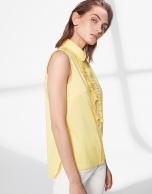 Yellow sleeveless blouse