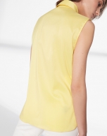 Yellow sleeveless blouse