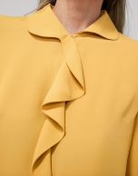 Gold shirt with ruffles