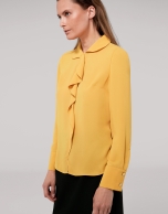 Gold shirt with ruffles