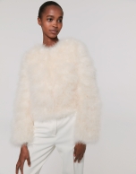 Oversize white jacket with turkey feathers