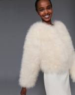 Oversize white jacket with turkey feathers