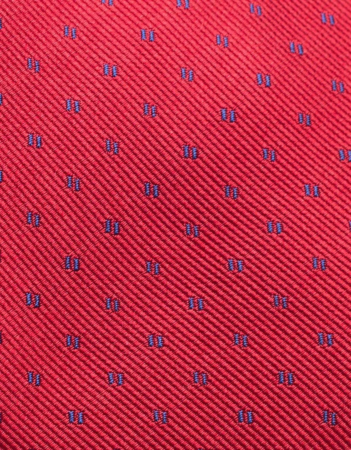 Red silk tie with blue jacquard