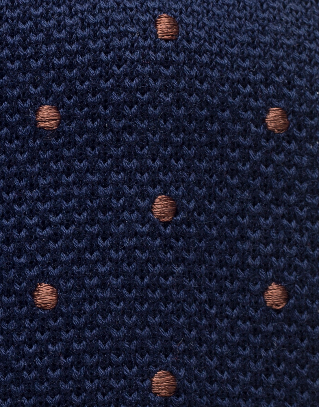 Blue knit tie with polka dots