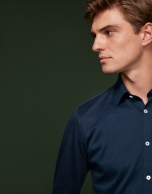 Navy blue herringbone knit sport shirt