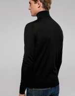 Black turtle neck sweater