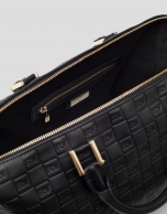 Black embossed leather Uve bowling bag