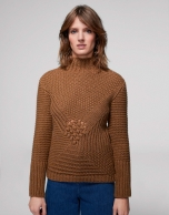 Brown knit sweater with openwork and knotted design