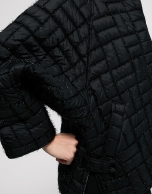 Short black quilted jacket