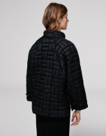 Short black quilted jacket