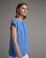 Blue blouse with short raglan sleeves