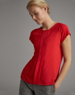 Red blouse with short sleeves