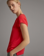 Red blouse with short sleeves