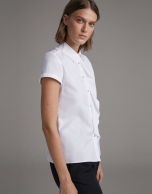 Loose white blouse with short sleeves 