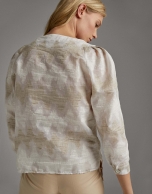 Beige shirt with boat neck and puffed sleeves