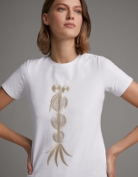 White top with beige ethnic embroidery