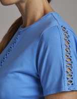 Blue top with lace on the front and sleeves