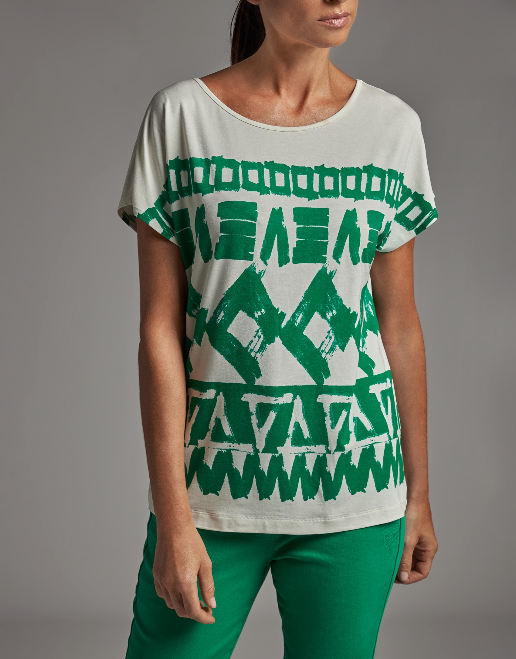 Green geometric print top