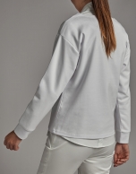 White sweatshirt with embroidered bird print and rhinestones