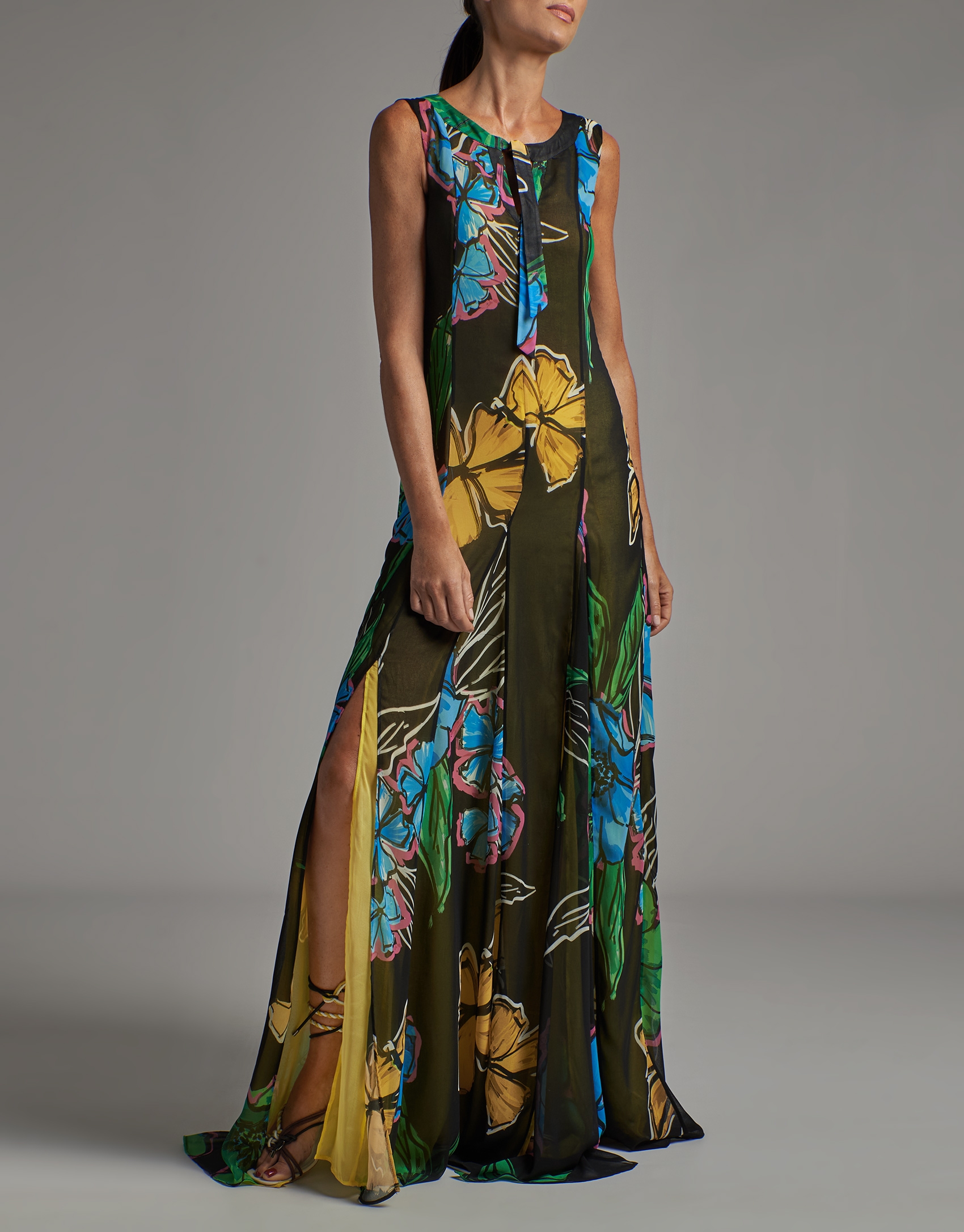 Long sleeveless flowing dress with floral print