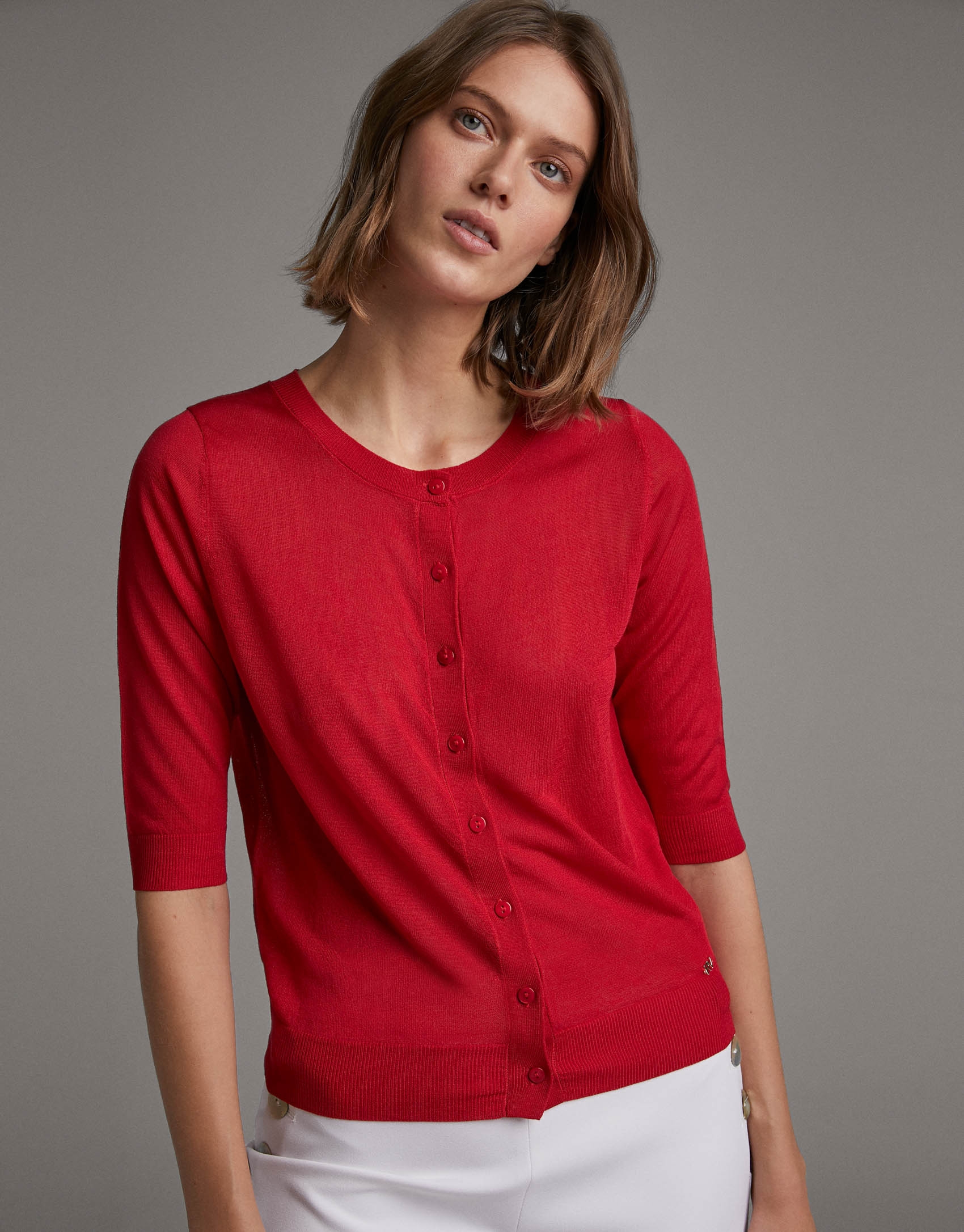 Red fine knit jacket with elbow-length sleeves