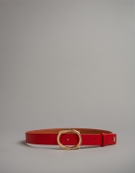 Red leather belt with round buckle