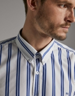 Dark blue and white sriped sport shirt