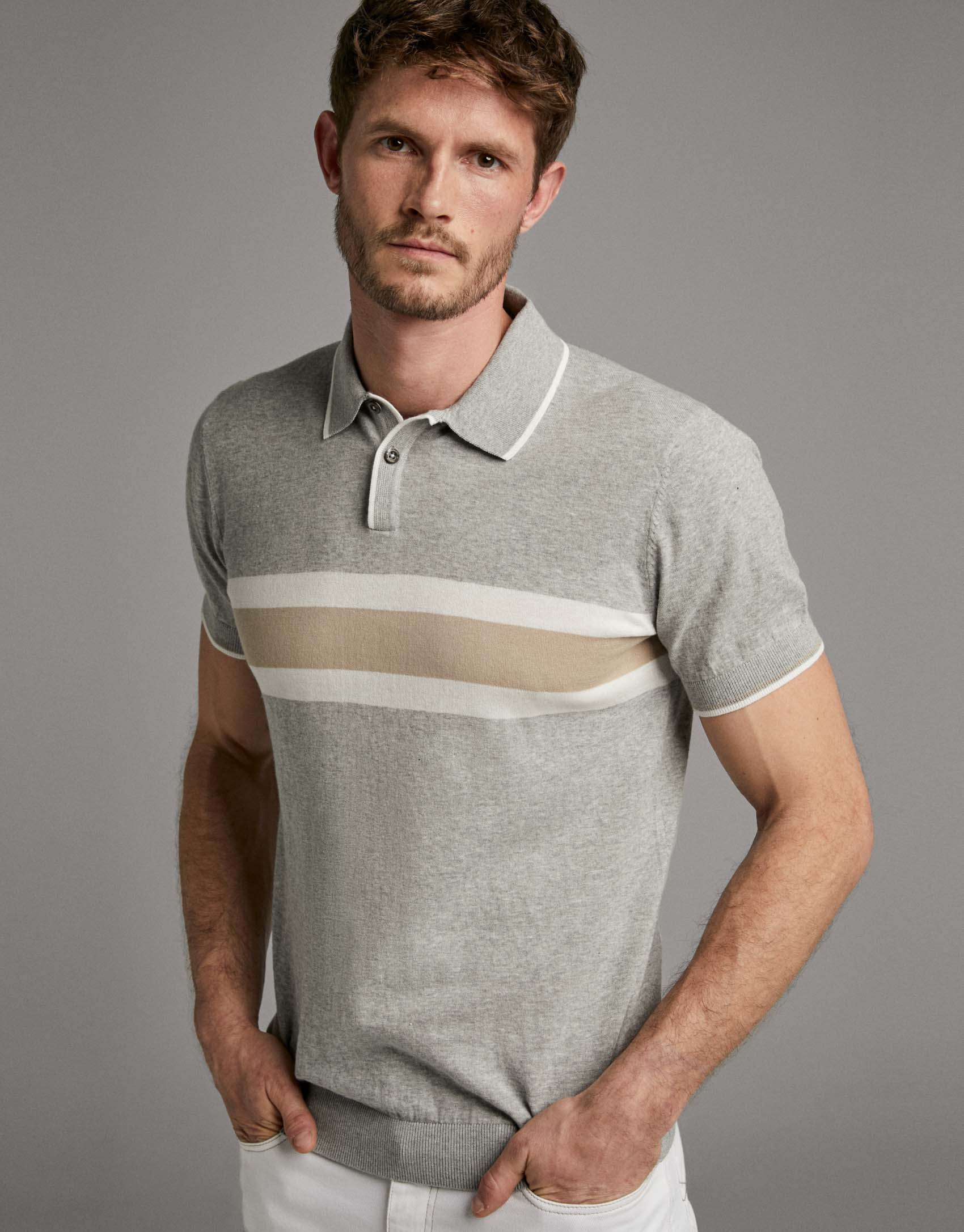 Tan and white knit polo shirt