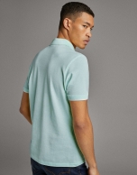 Light turquoise piqué polo shirt