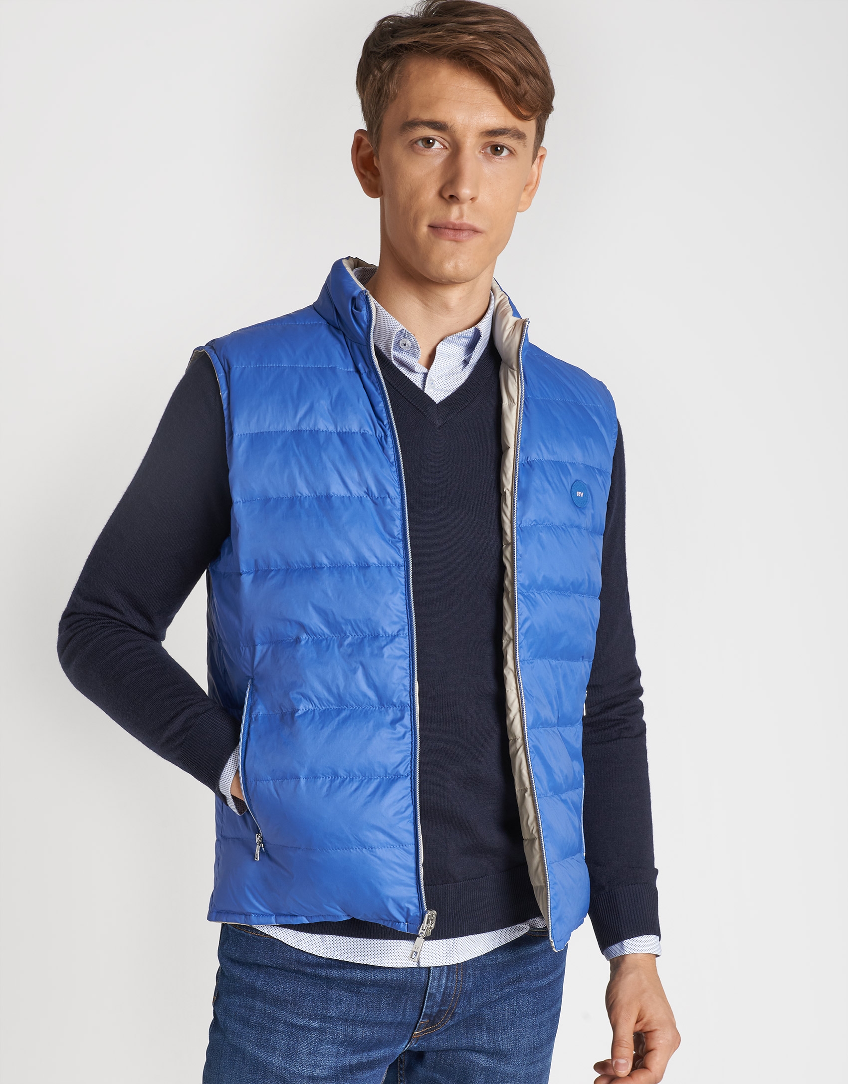 Light blue and beige reversible vest