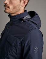 Navy blue tech fabric parka with four pockets