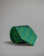 Green tie with blue and white stripes