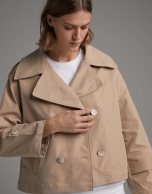 Short beige parka with double row of buttons