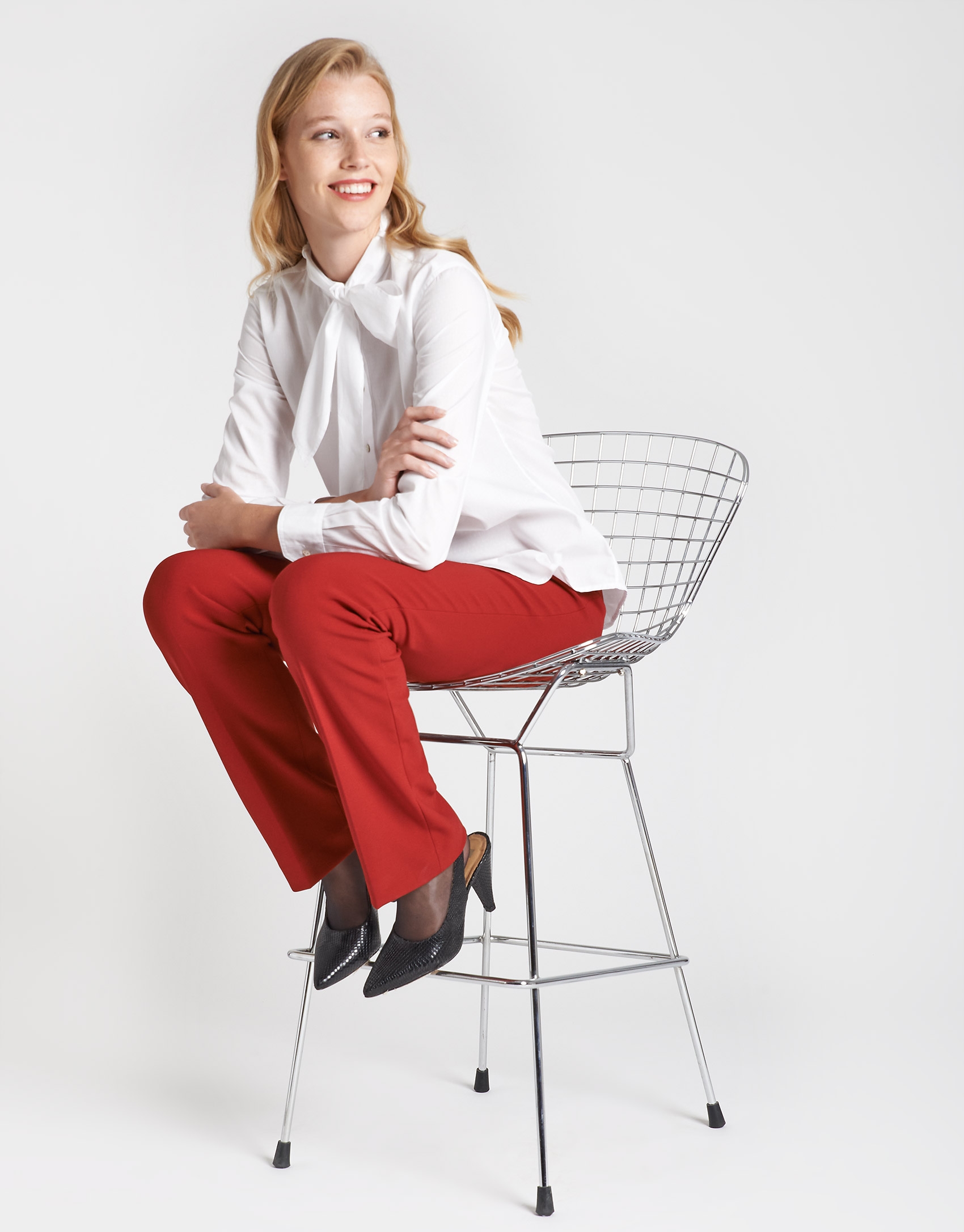 Red back-stitched straight ankle-length pants