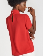 Red top with high collar 