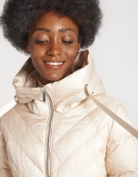 Beige long ski jacket with hood