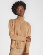 Beige sweater with slits