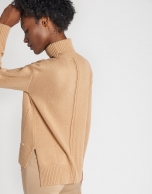 Beige sweater with slits