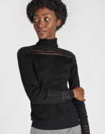 Black ribbed sweater with transparencies