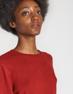 Red openwork sweater