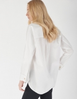 White loose blouse with long sleeves