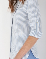 Blue and white striped shirt with belt loops on sleeves