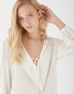 White blouse with V-neck