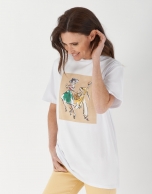 White top with fashion drawing of two figures