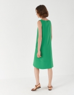 Green sleeveless dress with asymmetric hem