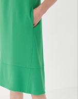 Green sleeveless dress with asymmetric hem