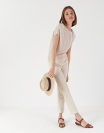 Sand-colored knit sweater with bat sleeves