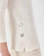 Beige sweater with side slit and mother of pearl button