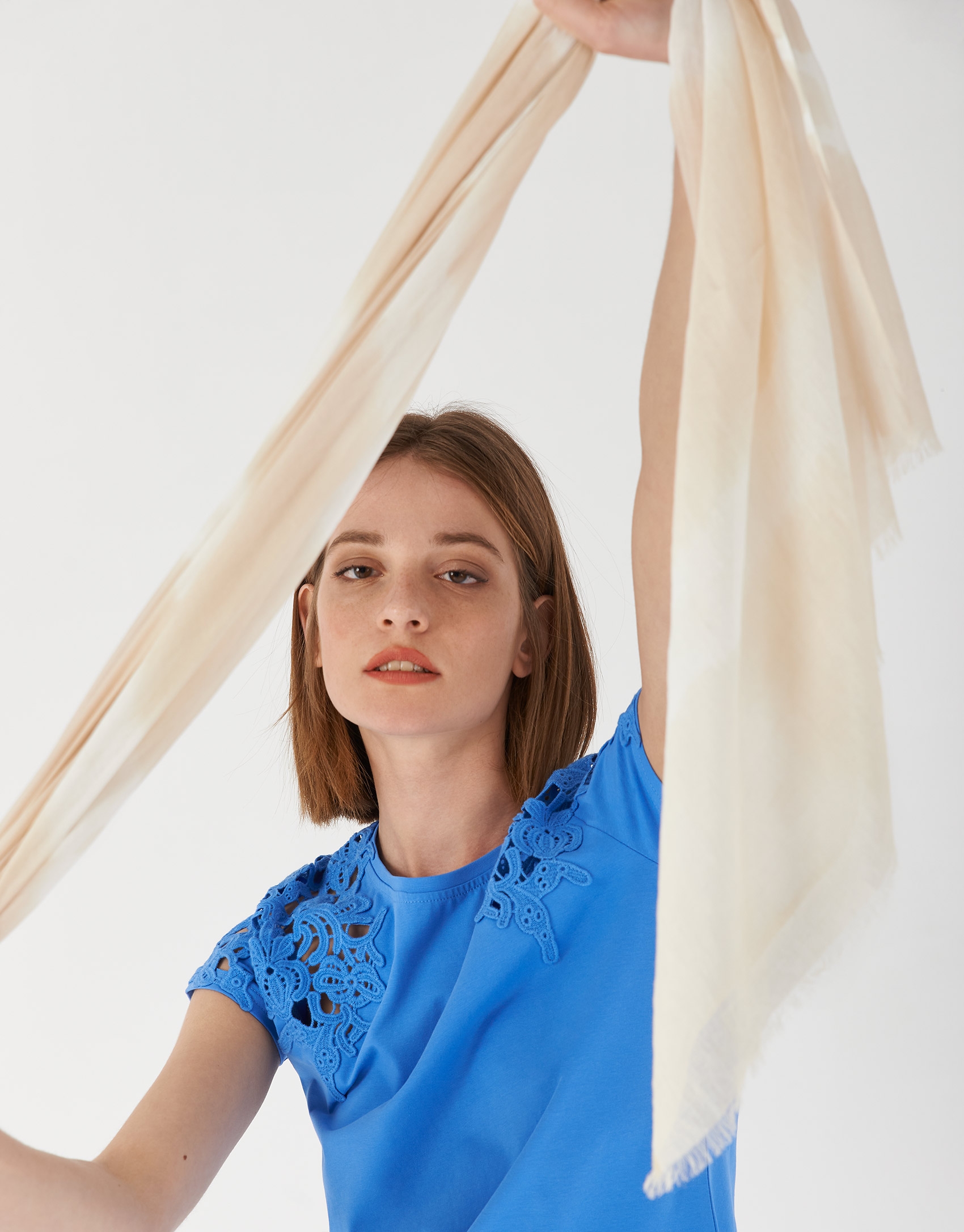 Beige scarf with cream-colored stripes