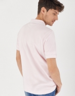 Pink pique cotton polo shirt with white outlines